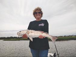 woman inshore fishing catch